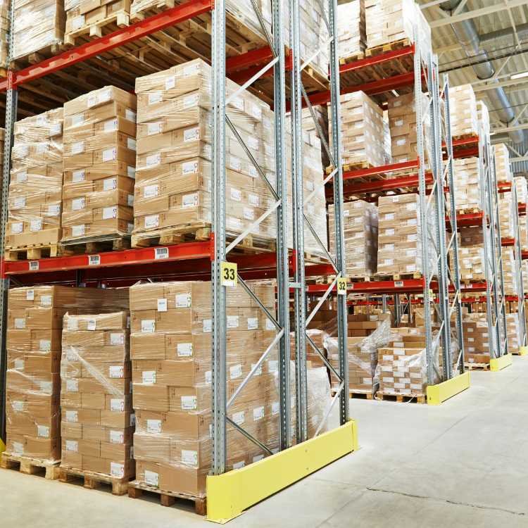 High-racking warehouse with palletised boxed cargo